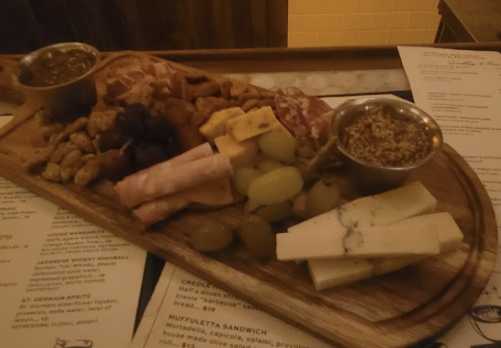 Leopold’s Book Bar and Cafe signature dishes Artisan Cheese & Charcuterie BoardsGourmet ToastsSeasonal Soups and Salads